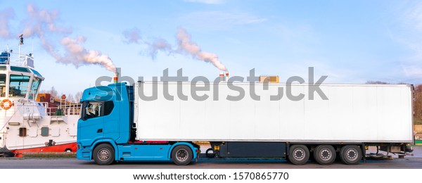 blue truck delivery commercial cargo with\
refrigerator trailer. Copy\
space.