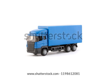 Blue truck miniature on white background 
