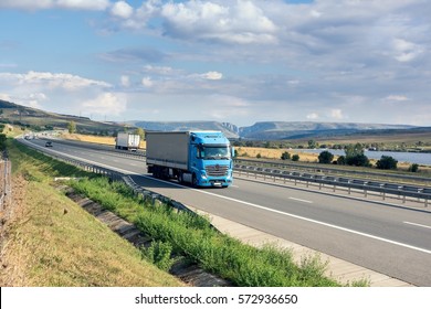 Blue Truck On Highway