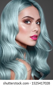 Blue Or Turquoise Hair.  Dye For Coloring. Close Up Portrait Of Fashion Model With Stylish Make Up, Pink Lips And Brown Eye Shadow.