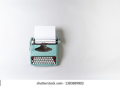 Blue Typewriter On Blank Background