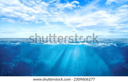 BLUE UNDER WATER waves and bubbles. Deep sea