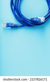 Blue UTP Internet Cable - Isolated On A Blue Background Ethernet Cord