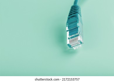 Blue UTP Internet Cable Isolated On A Blue Background Ethernet Cord