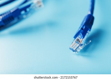 Blue UTP Internet Cable Isolated On A Blue Background Ethernet Cord