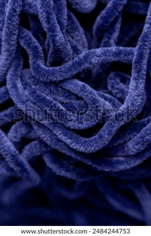 blue velour threads for knitting things, new soft blue threads with traces of other threads in close-up
