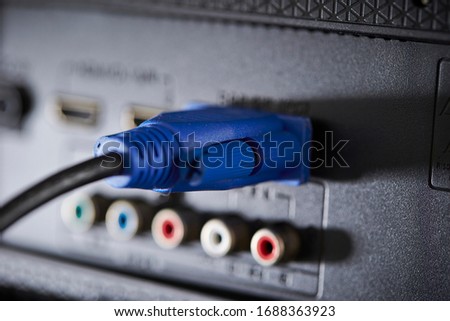 Blue VGA cable connected with electrical appliances