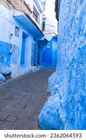 The blue village of Chefchaouen in Morocco is truly enchanting. Known as the "Blue City," Chefchaouen captivates visitors with its picturesque cobblestone streets adorned with houses painted in vibran - Shutterstock ID 2362064593