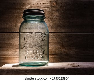 Blue Vintage Jar With Wood Background