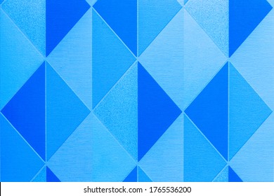 Blue wallpaper texture with abstract geometric pattern pyramid background
