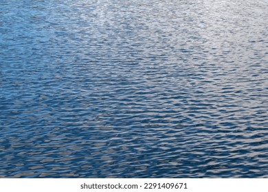 a blue water background in the morning - Powered by Shutterstock