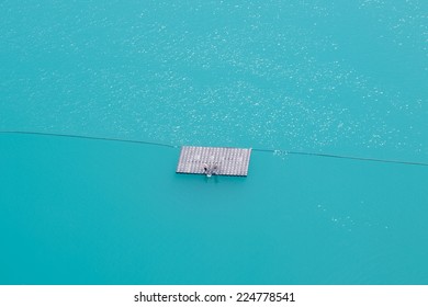 Blue water with bathing platform