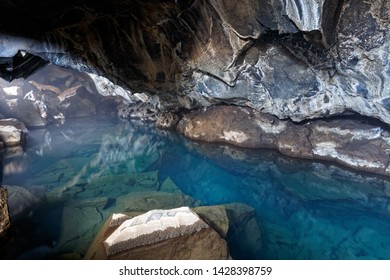 Blue Water In Grjótagjá Cave, In Iceland