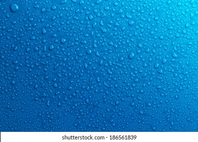 Blue water drops background - Shutterstock ID 186561839