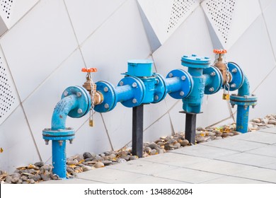 Blue Water Meter And Valve Supply Pipe With Joint And Hold On Cement Wall