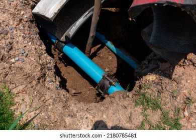 Blue Water Pipe Buried Under The Ground