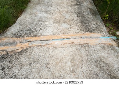 Blue Water Pipe Buried Under Cement.