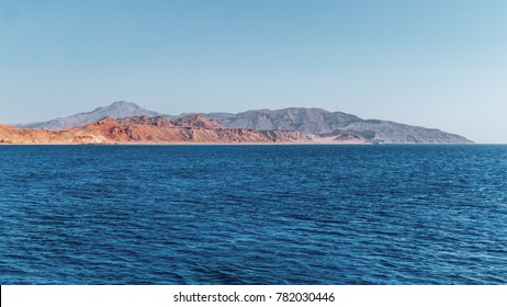 Blue Water Of The Red Sea And Deserted Shore