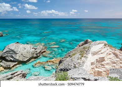 Blue Water For Snorkel In Bermuda Island. Island Coast With Crystal Clear Water