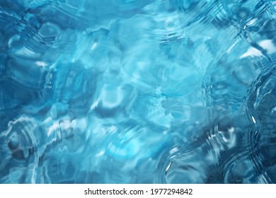 Blue water surface background, studio shot
