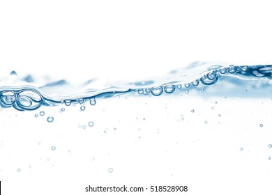 Blue water surface with single wave and a few bubbles