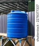 Blue water tank of industrial building.