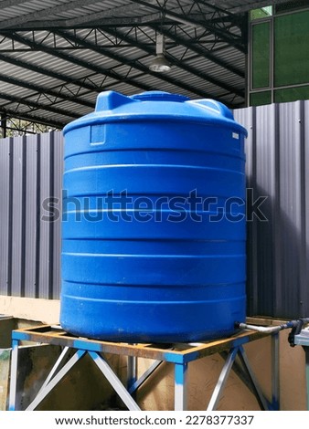 Blue water tank of industrial building.