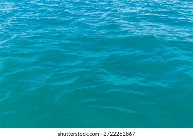 Blue water texture background. Surface of the sea