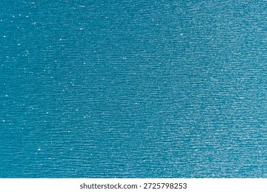 Blue water texture background. Surface of the lake