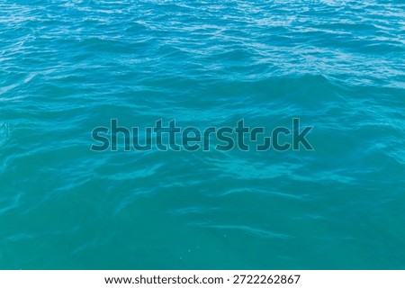 Blue water texture background. Surface of the sea