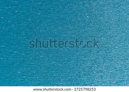 Blue water texture background. Surface of the lake