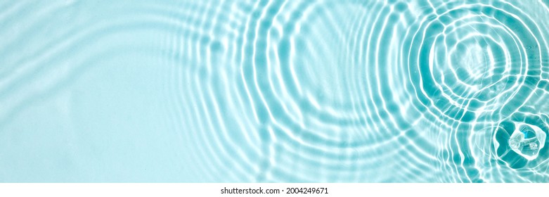 Blue water texture, blue mint water surface with rings and ripples. Spa concept background. Flat lay, copy space. - Shutterstock ID 2004249671
