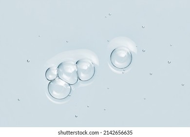 Blue water toner serum texture with bubbles. Skincare cosmetic liquid product closeup - Shutterstock ID 2142656635