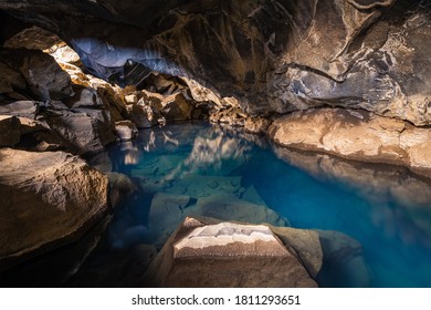 The Blue Waters Of Grjótagjá Cave In Iceland.