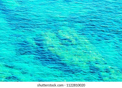 Blue Waters Of The Mediterranean Sea In Province Of Cagliari In South Sardinia In Italy.