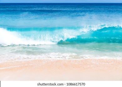 Blue waves on the beach in Hawaii