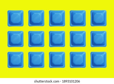 Blue weighing boats on yellow background, top view. Square pattern. Flat lay view.