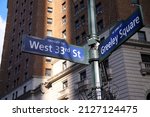 Blue West 33rd Street and Greeley Square on Broadway historic sign in Midtown Manhattan in New York City