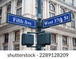 Blue West 37th Street and Fifth Avenue historic sign in midtown Manhattan in New York