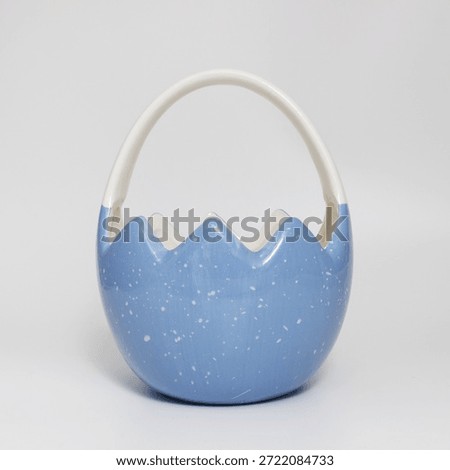 A Blue and White Ceramic Easter Egg Basket Decoration