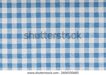 Blue and white checkered, pattern, design, cotton fabric for sewing, texture background close-up