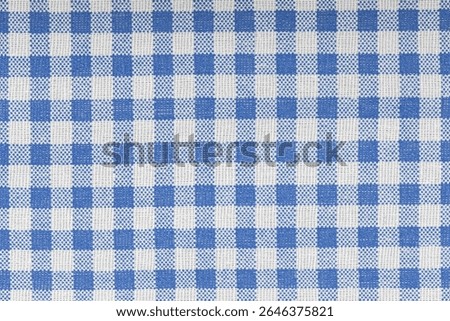 Blue and white checkered, pattern, design, cotton fabric for sewing, texture background close-up