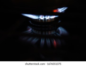 Blue And White Flames Of Natural Gas Burning Stove Top Closeup