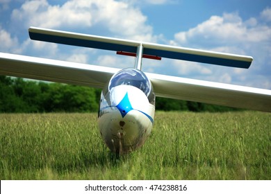 Blue White Glider Plane On Airpoert Grass