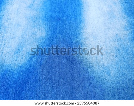 Blue and white gradient texture on clothing or clothes. Smooth blue texture. Abstract background. Simple and plain background.