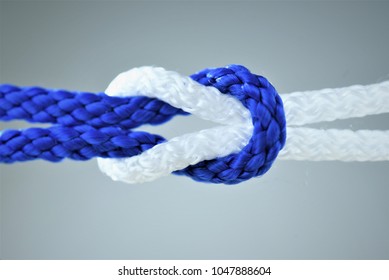 Blue And White Rope Knot On Gray Background