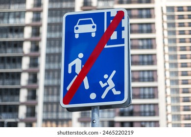 A blue and white sign showing a red line across it, indicating restriction. Belongs to keywords like Motor vehicle, Road, Traffic sign, Infrastructure and Electric blue - Powered by Shutterstock