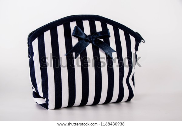 blue and white striped suitcase