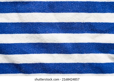 Blue And White Striped Fabric Of An Outdoor Lounge Chair.