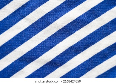 Blue And White Striped Fabric Of An Outdoor Lounge Chair.